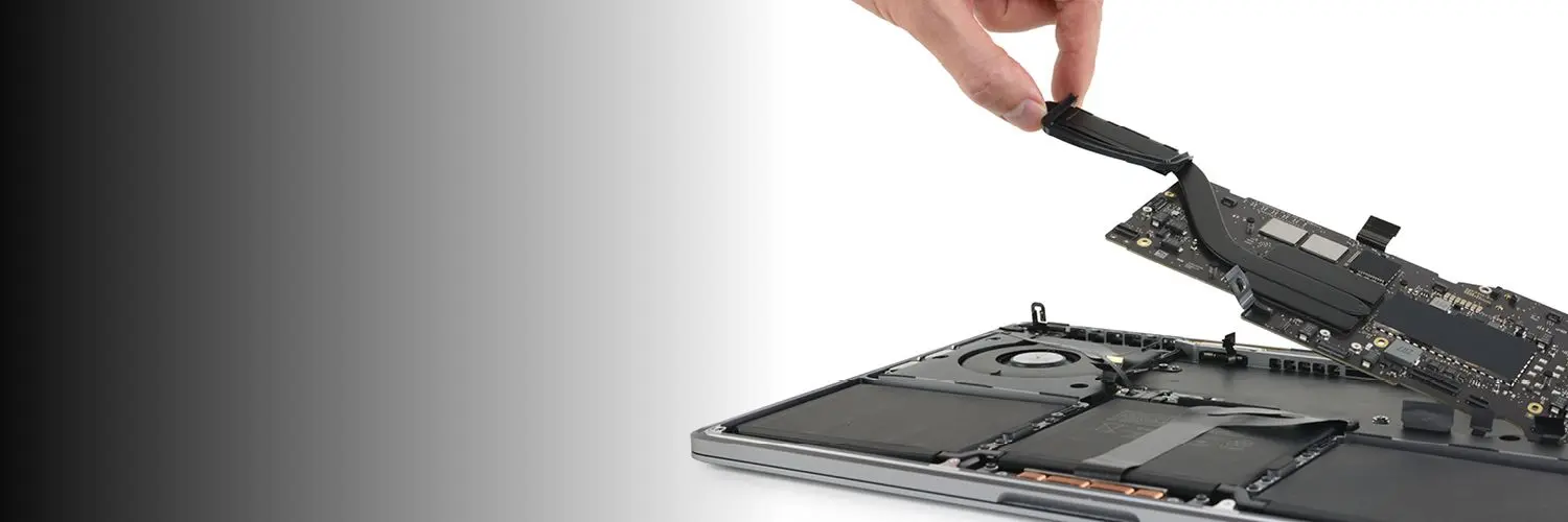 Technicians repairing a circuit board